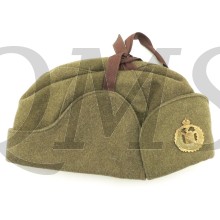 A standard pattern, olive drab wool, cold weather cap with fold-down side flaps. The cap is nicely maker marked by the company 'Buffalo Cap & Neckwear Ltd' from Winnipeg and dated 1943(?). 