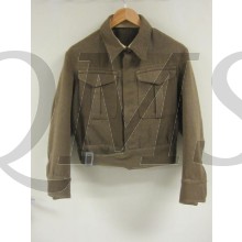 Austerity Pattern Battledress introduced in 1940 saw some small changes to the original design, a lined collar and slightly closer cut to the blouse and a new dressing pocket on the trousers with two pleats and an exposed shank button.