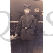 AnsichtsKarte (Mil. Postcard) Soldier posing at table 1916