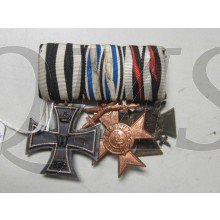 A three-place medal bar with the 1914 Eisernes Kreuz II. Klasse, the BayMVK3 mit den Schwertern and the Ehrenkreuz für Frontkämpfer 1914-18.