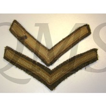 British WW2 Woven Lance Corporal stripes on a wool background.  This design of rank stripes was worn on the 1937 and 1940 pattern Battle Dress uniforms.