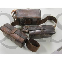 Standard issue, model 30 (1897) rear ammunition pouch as used by the Japanese army throughout the war. Pouch is approximately 17.5cm x 9.5cm x 7.5cm. Dual pocket, brown leather pouch originally would have held sixty rounds of 7.7mm ammunition, for a total