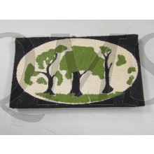 The oak, ash, and thorn in an oval was chosen as a link with the name of its commander, Major-General Sir A.F.A.N. Thorne and with the Oak, the Ash and the Thorn in Puck of Poock's Hill by Rudyard Kipling, the Corps having being raised in Pook's Hill coun