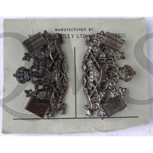 Pair of matched KC officer's bronze (mirror left and right) collar badges for the Royal Canadian Corps of Signals