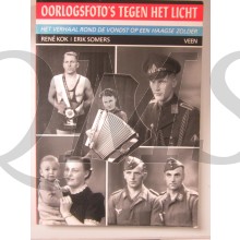 Oorlogsfoto`s tegen het licht / het verhaal rond de vondst op een Haagse zolder