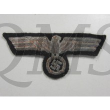 Panzer officers breast eagle in silver wire on black wool.