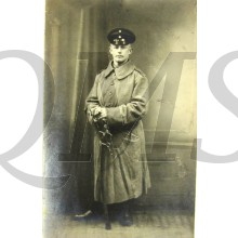 Studio portter German Soldier in greatcoat with sabre