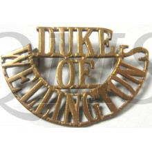 Shoulder title brass Duke of Wellington's Regiment