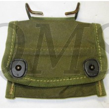  A waterproof, khaki compass pouch with single flap and a pair of lift the dot closures. The pouch measures approximately 11cm x 8cm with bent brass hooks to the reverse.