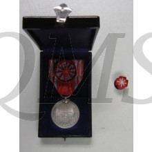 Red Cross merit medal silver with rosette