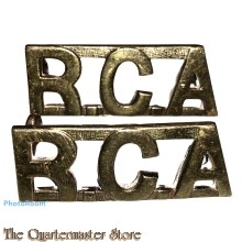 Shoulder titles R.C.A. (brass)