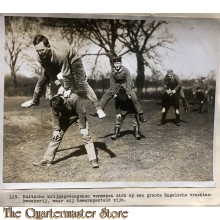 Press photo , WW1 Western front , German POW at fruit nursery Leapfrogging during break