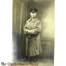 Studio portter German Soldier in greatcoat with sabre