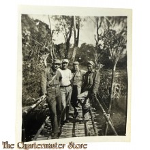 Small WW2 photo of 4 US soldiers 