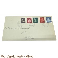 Enveloppe met Volksdienst en Winterhulp postzegels 1944