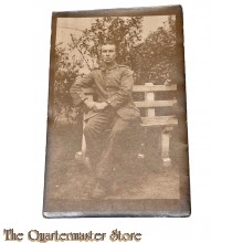 Postkarte/ Photo 1916 Deutscher Soldat auf einer Bank 