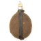 This is a nice German World War 1 M1893 Canteen (Feldflasche). Aluminum canteen, closed by a cork, I've not seen this type of cork before. The canteen is complete with felt cover and leather harness. The canteen is not visible maker marked or dated. The c