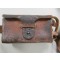 Standard issue, model 30 (1897) rear ammunition pouch as used by the Japanese army throughout the war. Pouch is approximately 17.5cm x 9.5cm x 7.5cm. Dual pocket, brown leather pouch originally would have held sixty rounds of 7.7mm ammunition, for a total