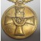 Medaille voor het 40-jarig lidmaatschap van de Bond van Nederlandse Militaire Oorlogsslachtoffers plus miniatuur