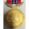 Medaille voor het 40-jarig lidmaatschap van de Bond van Nederlandse Militaire Oorlogsslachtoffers plus miniatuur