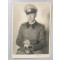 Photo (Mil. Postcard ) 1943 WH NCO  with overcoat and schirm mutze/sabre