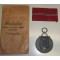 Medaille für die Winterschlacht im Osten mit Verlehungs Tüte  (German Eastern Front Medal with presentation enveloppe)
