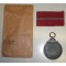 Medaille für die Winterschlacht im Osten mit Verlehungs Tüte  (German Eastern Front Medal with presentation enveloppe)