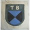 it shows the black-/blue-coloured shield with above the interwoven 'Cyrillic' characters: 'TB'. Simply a truly rarely encountered piece of eastern volunteer related insignia: one of the more harder to encounter specimen of the colourfull series!