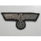 Panzer officers breast eagle in silver wire on black wool.