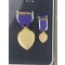 boxed purple hart with miniature and ribbons