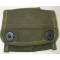  A waterproof, khaki compass pouch with single flap and a pair of lift the dot closures. The pouch measures approximately 11cm x 8cm with bent brass hooks to the reverse.