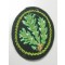 Nicely machine-embroidered on a dark-green woolen base. Nice original example in good unissued condition!