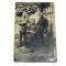 Postkarte/ Photo 1914 3 German soldiers in a garden , 1 sitting 